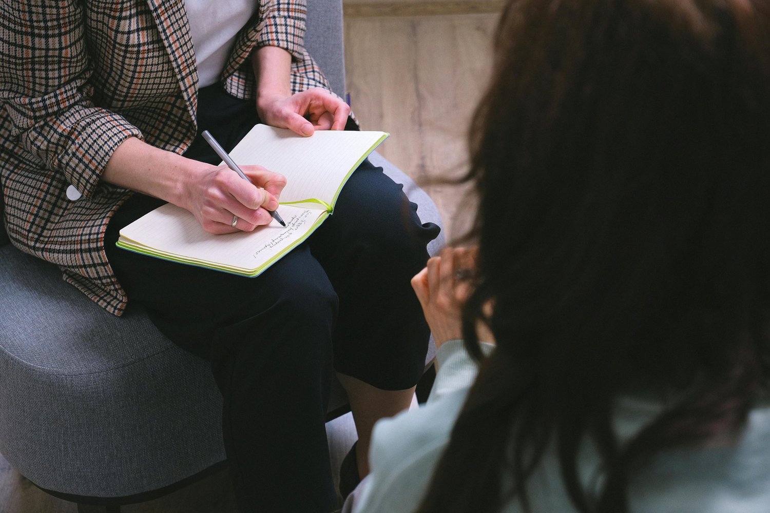 Person meeting with a therapist to address contamination OCD through evidence-based counseling in Arizona.
