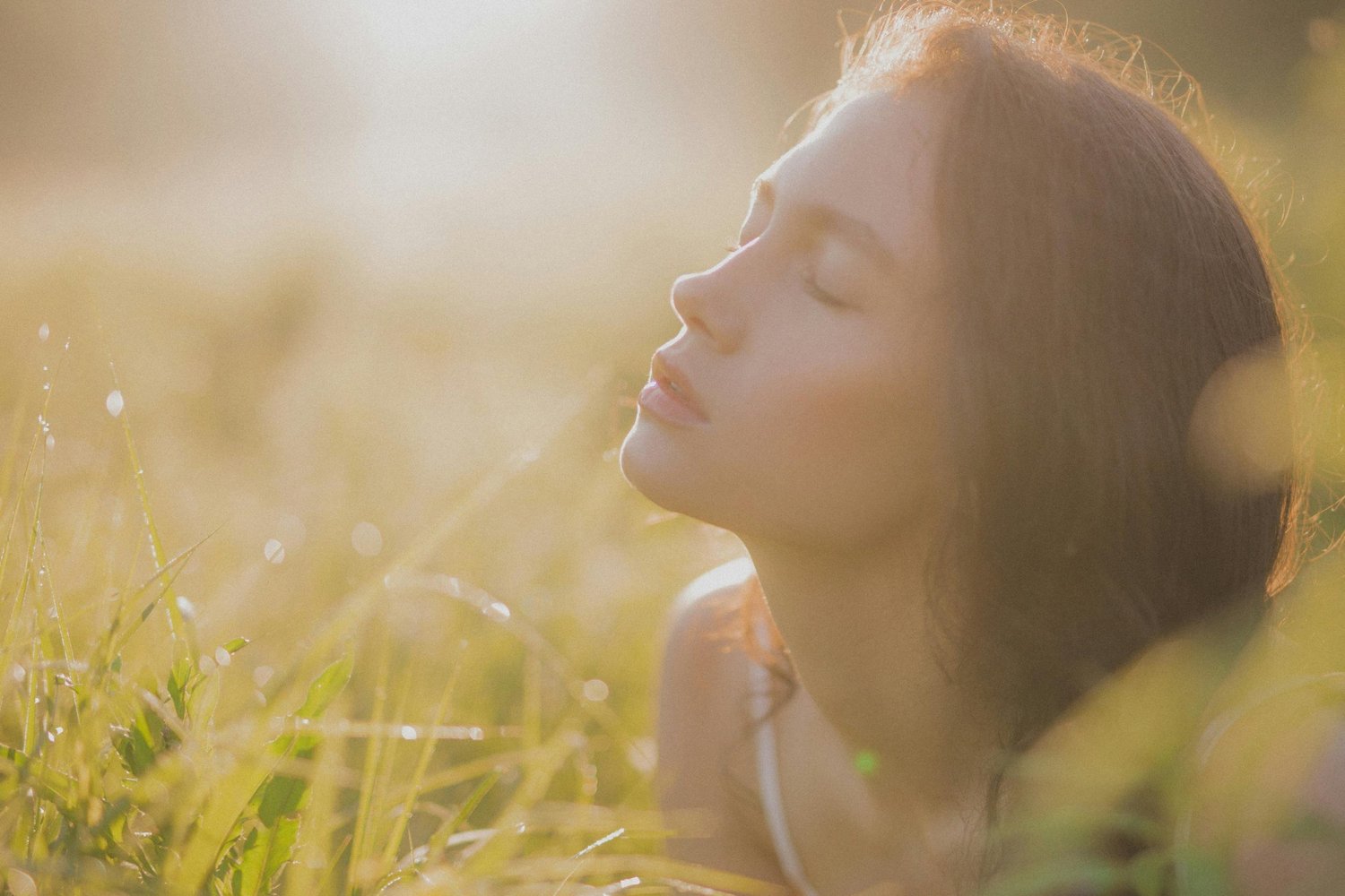Woman practicing mindfulness outdoors to support mental health wellness and OCD therapy in Arizona.