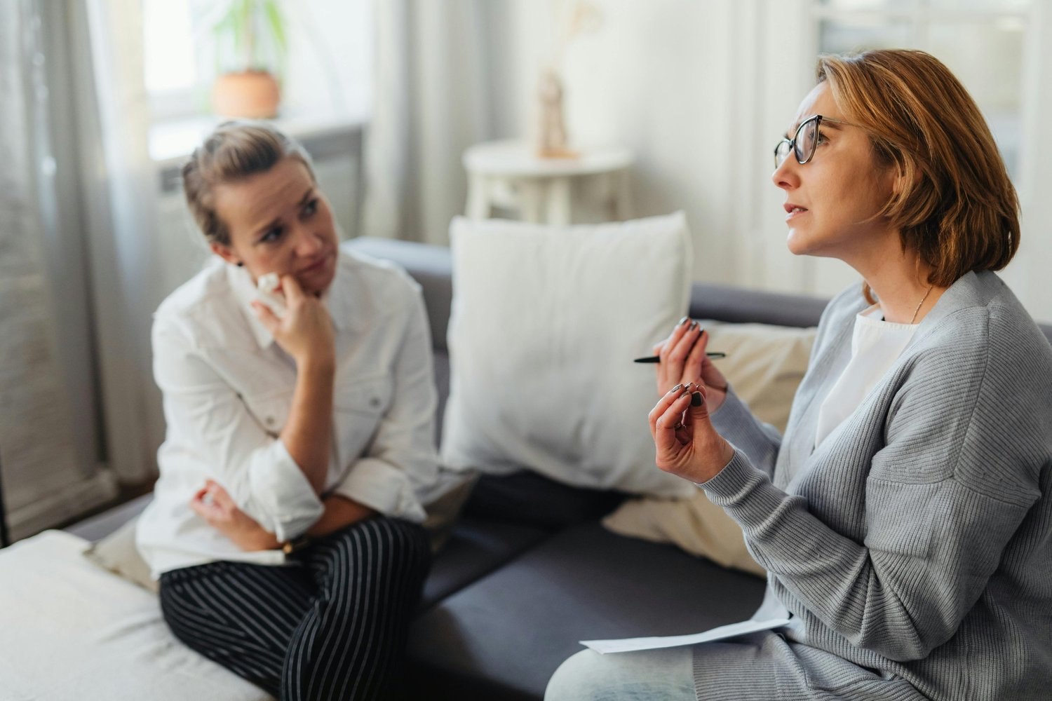 Woman receiving support for OCD in a therapy session in Arizona