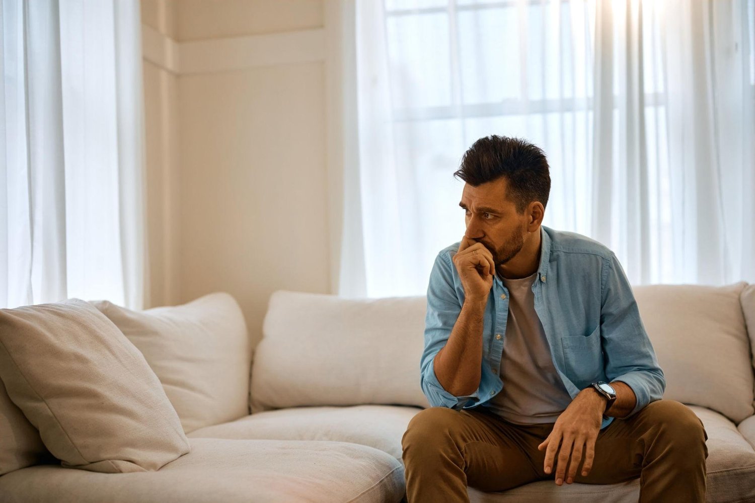 Adult experiencing intrusive thoughts and uncertainty related to obsessive compulsive disorder